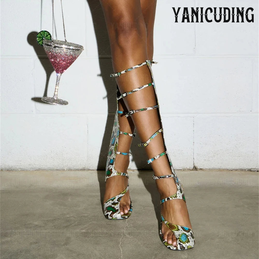 CurveStep | Asymmetrical Gladiator Sandal Boots – Glossy Snakeskin