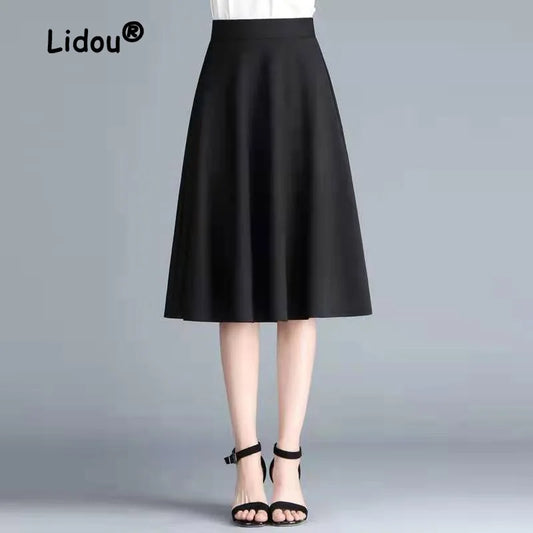 Solid Color Elastic A-Line Midi Skirt — Office Versatile